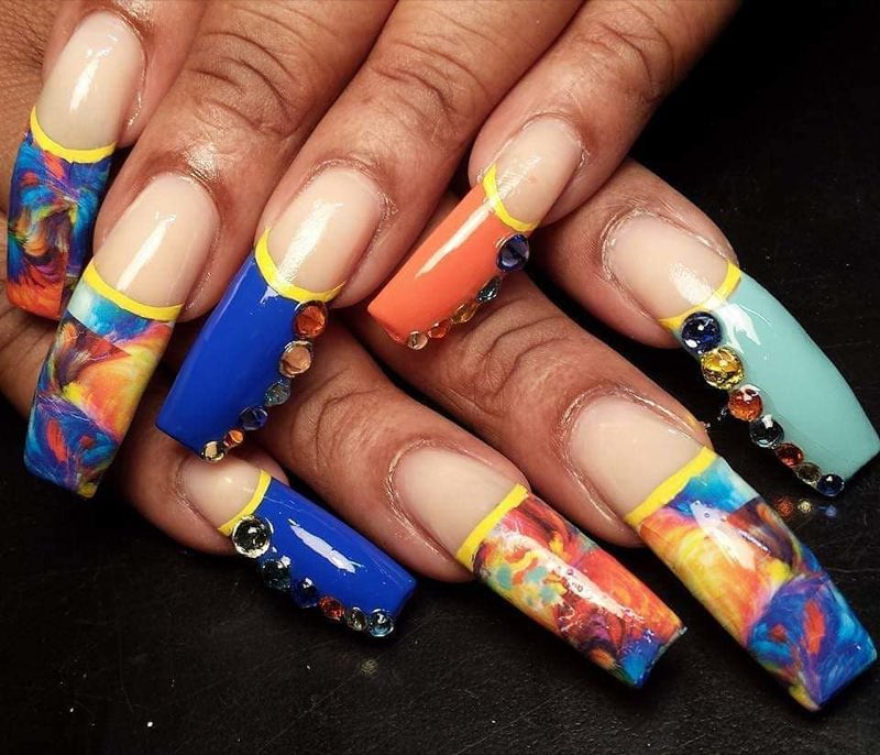 Colorful acrylic nail art with rhinestones